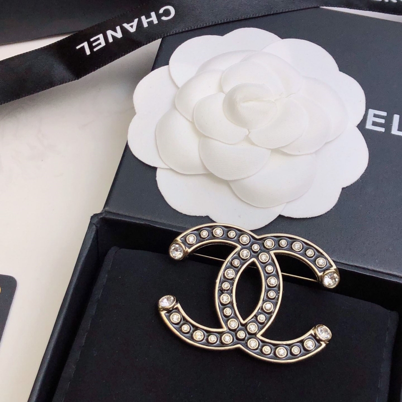 Ch**el brooches